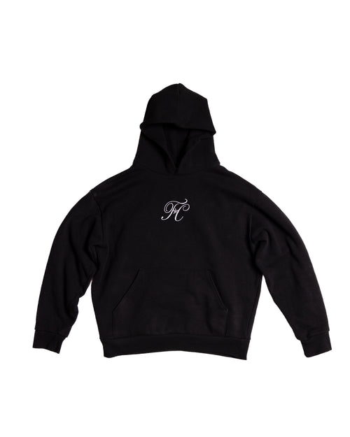 TC Hoodie in black, front with small embroidered TC monogram