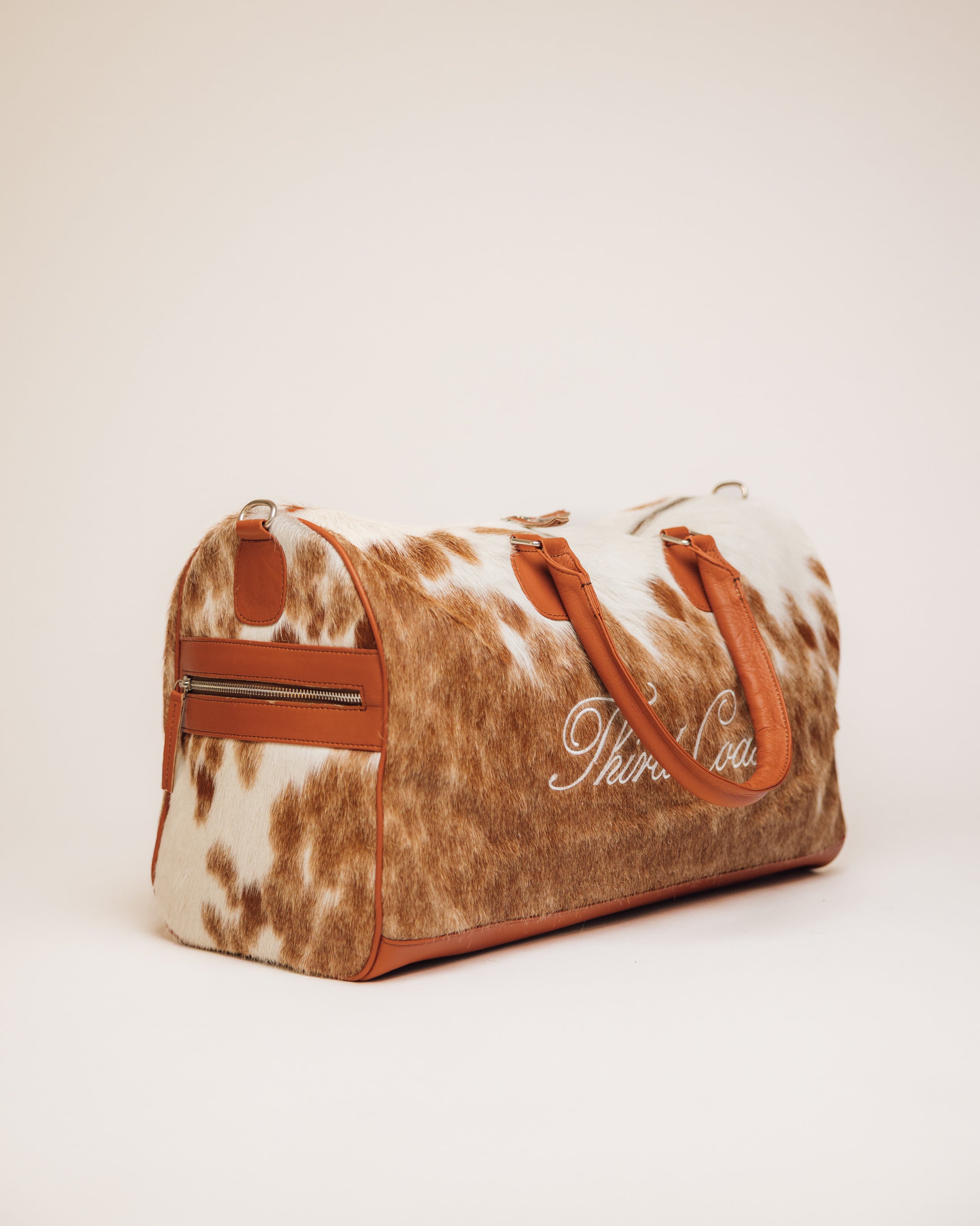 Cowhide duffle bag leather base and stitching, Red Angus