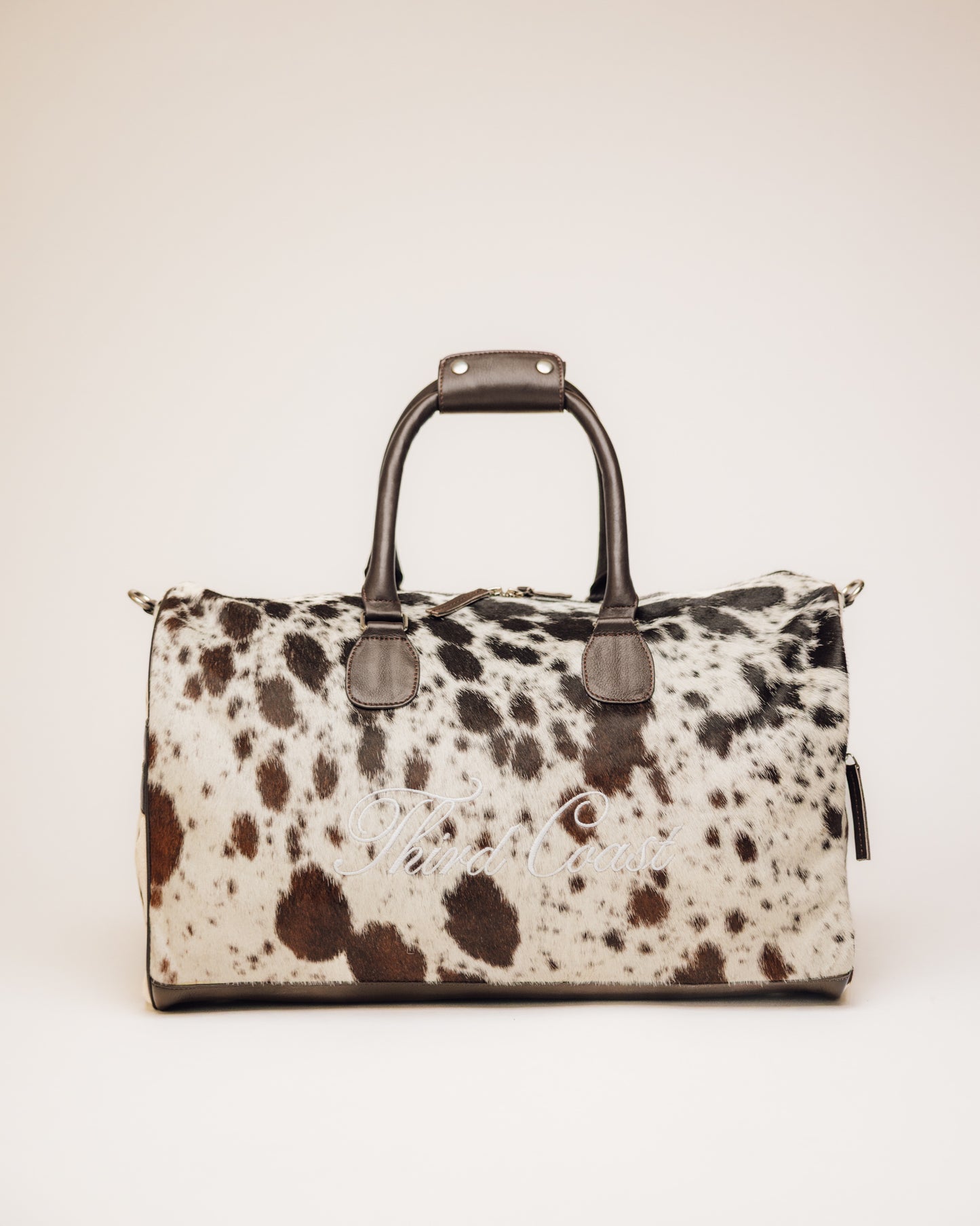 Cowhide Duffle | Brown and White
