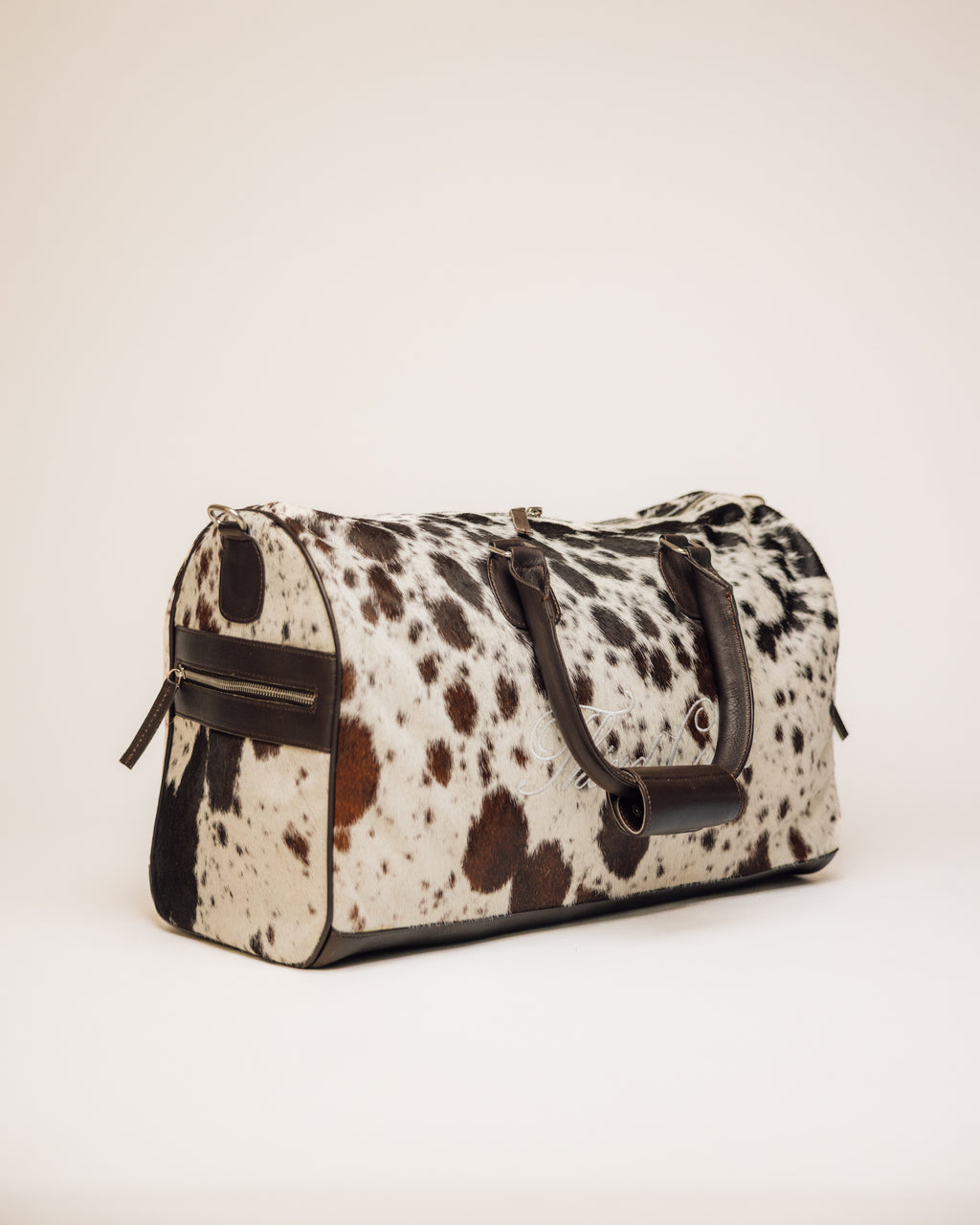 Cowhide Duffle | Brown and White