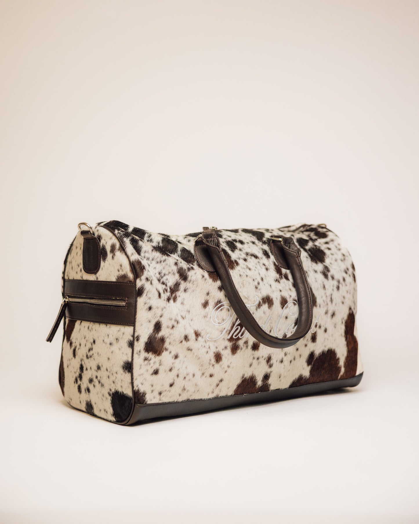 Cowhide Duffle | Brown and White