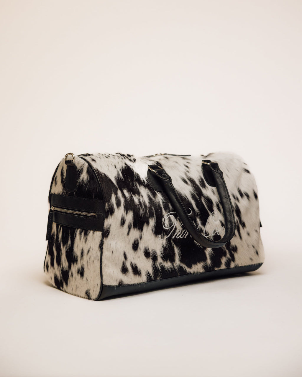 Cowhide duffle bag interior lining, black and white