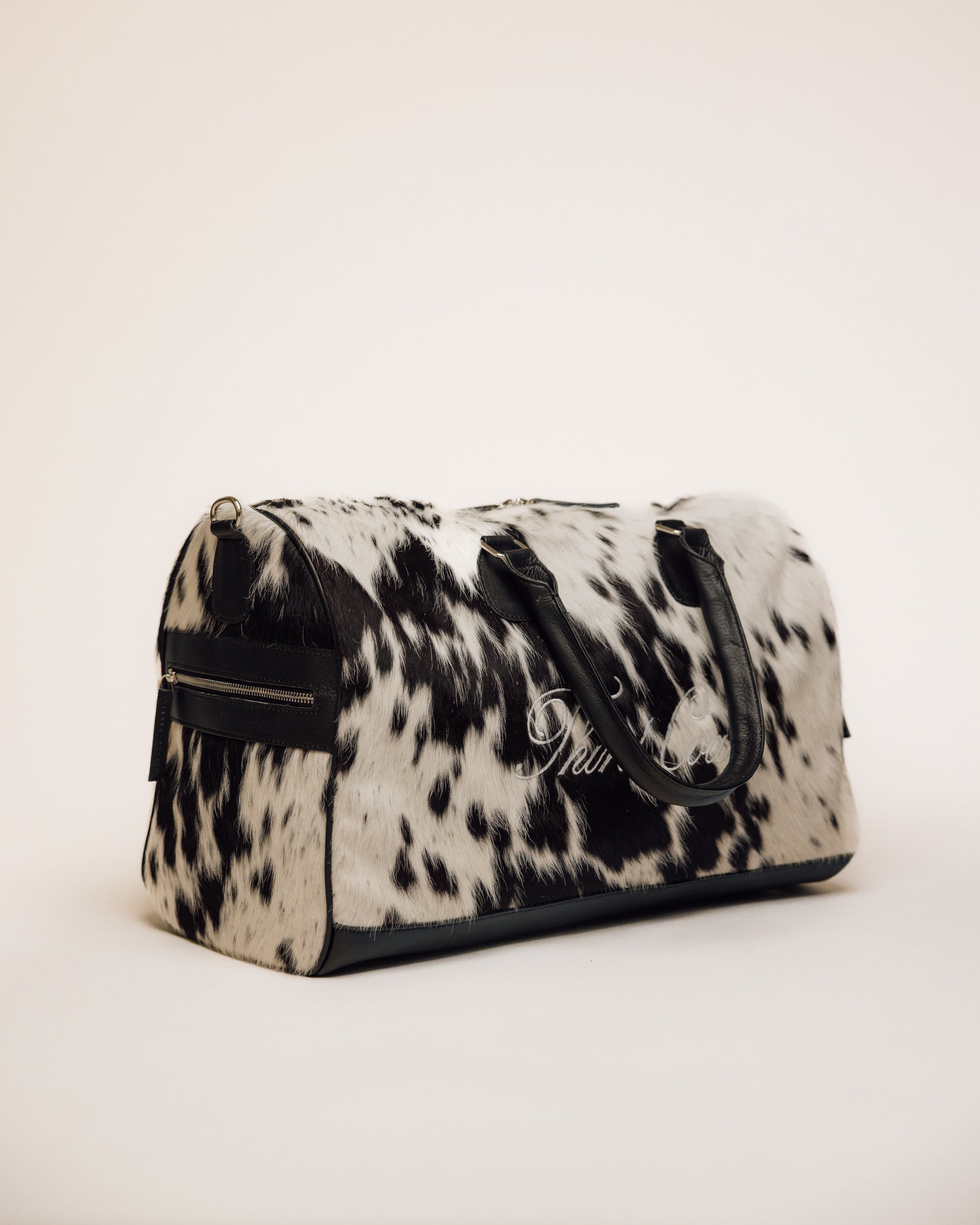 Cowhide duffle bag interior lining, black and white