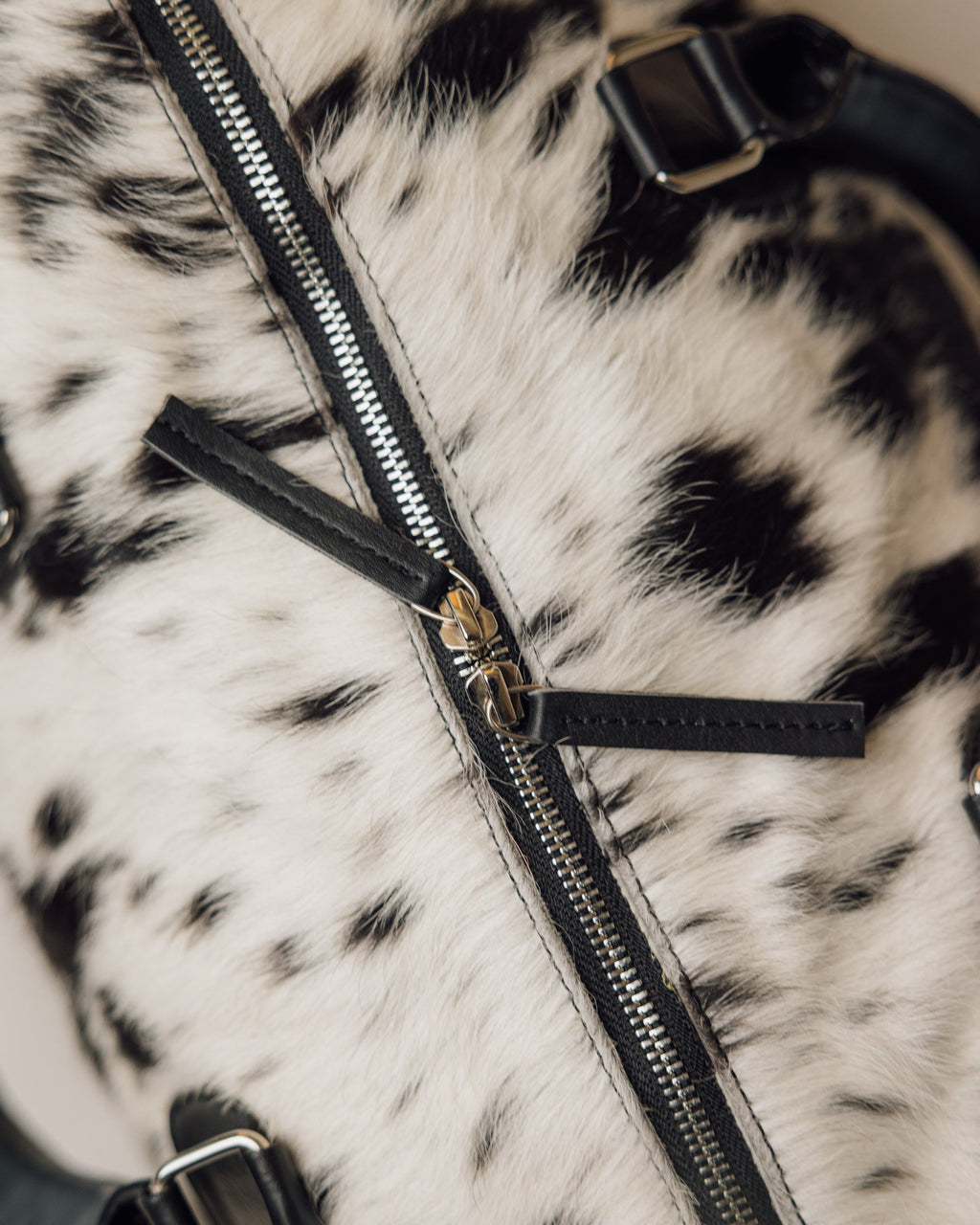 Cowhide duffle bag leather base and stitching, black and white