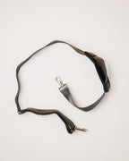 Black and white cowhide duffle, top-down view