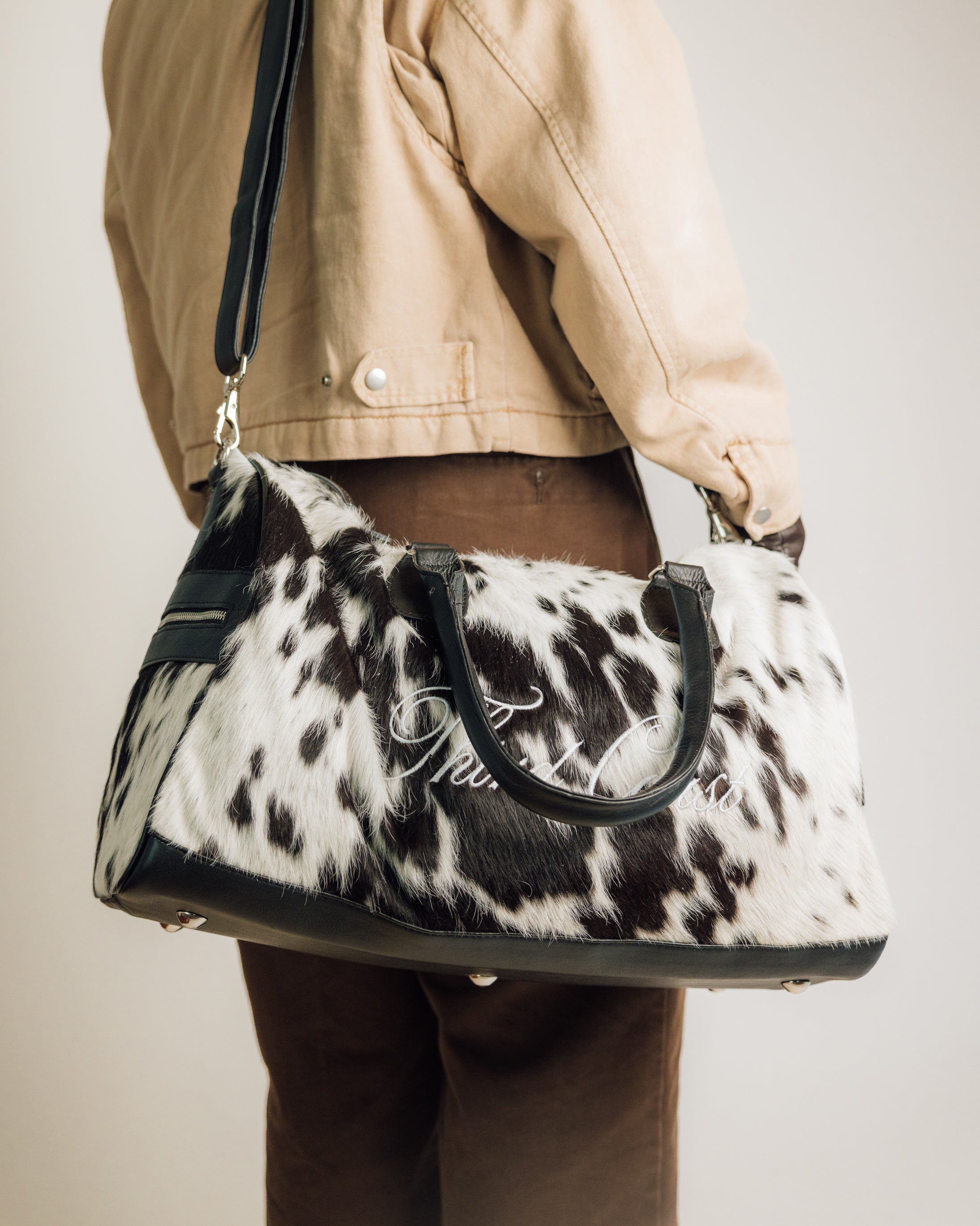 Cowhide duffle bag detail of hair-on hide pattern, black and white