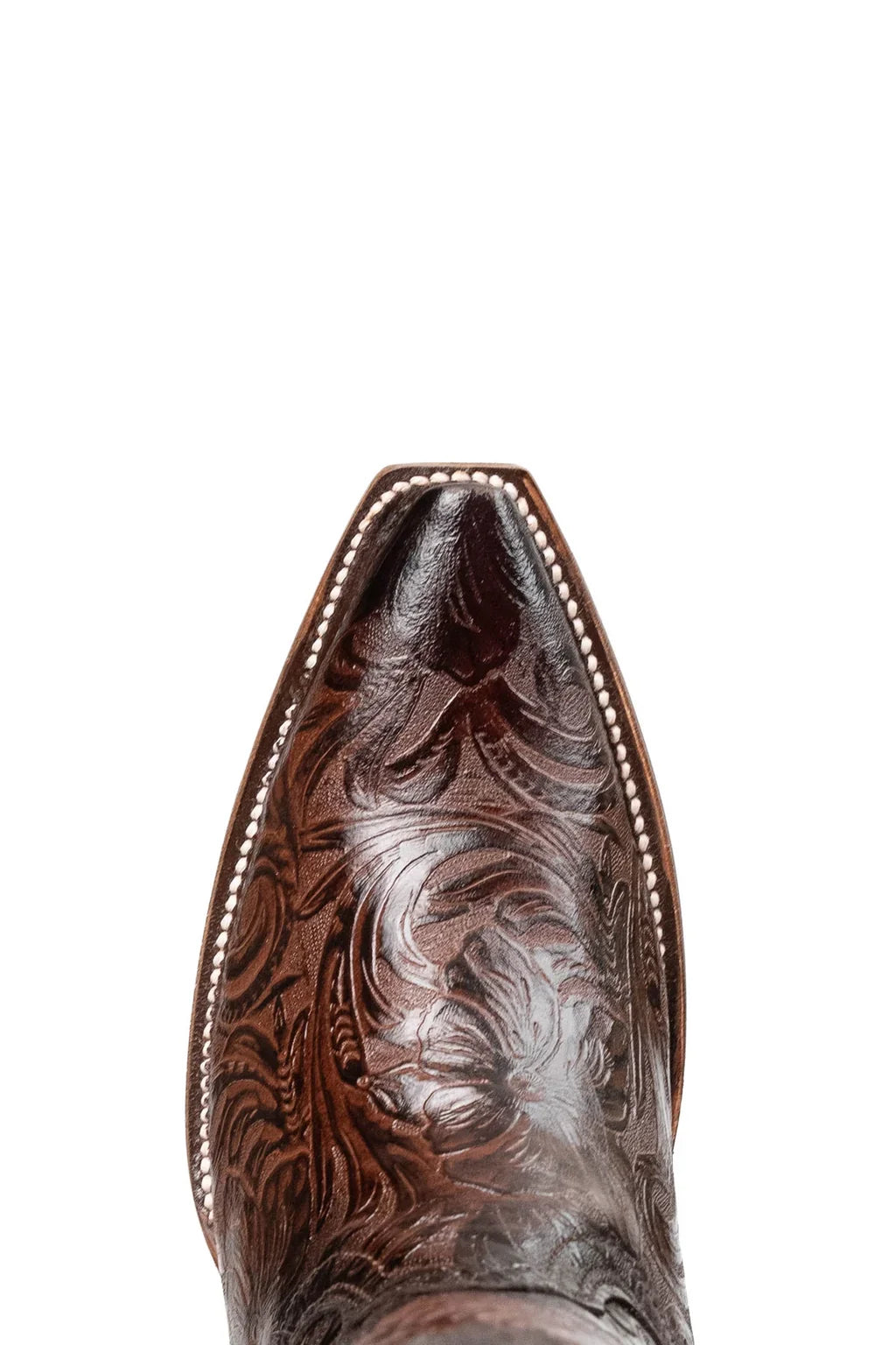 Close-up of hand-tooled floral pattern on dark brown leather cowgirl boot