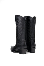 Back view of black leather cowgirl boot shaft and pull straps