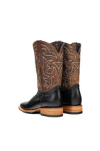 Back view of black and brown cowboy boot shaft and pull straps